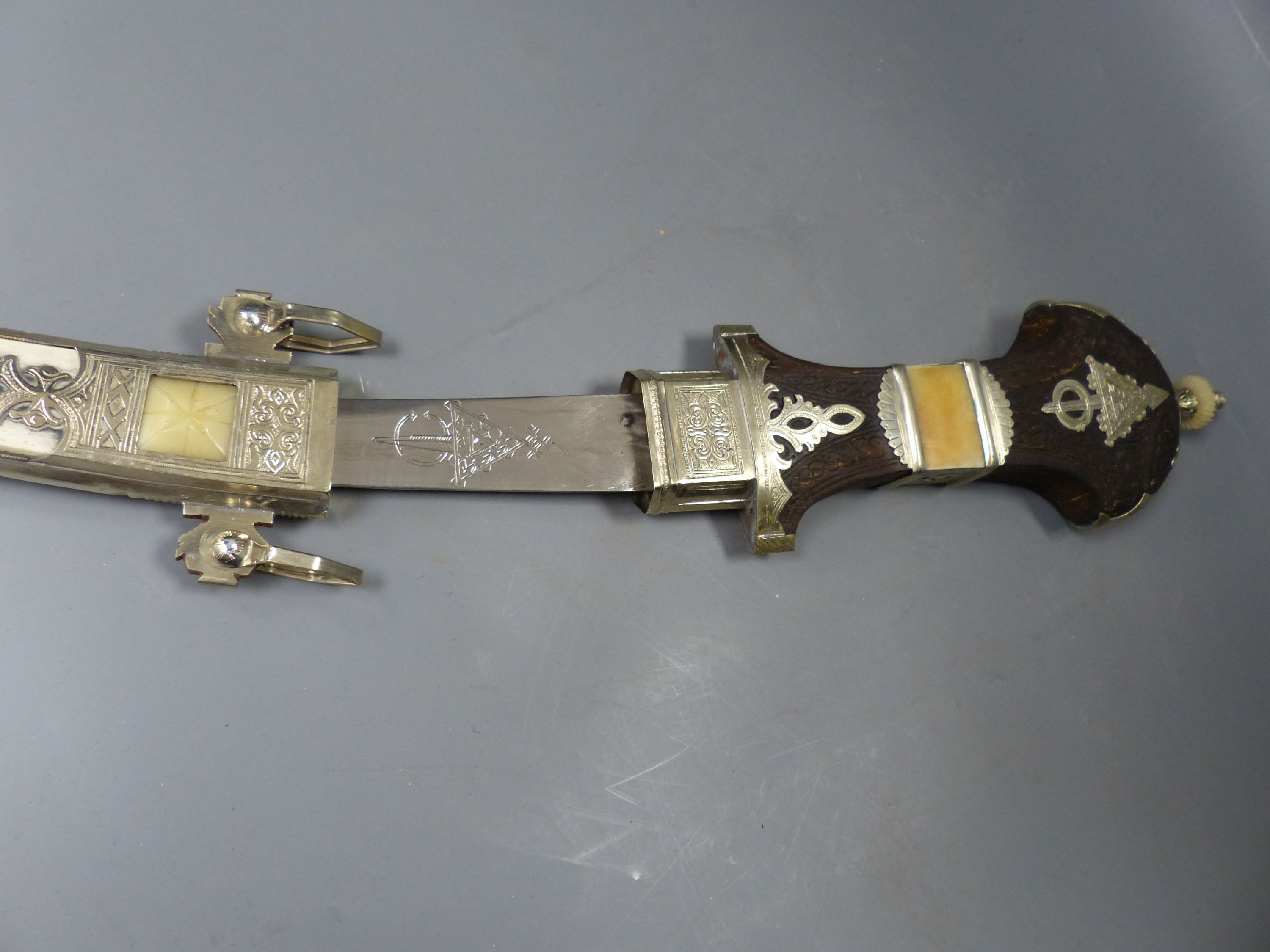 An Islamic silver and bone mounted Jambiya, overall length 60cm